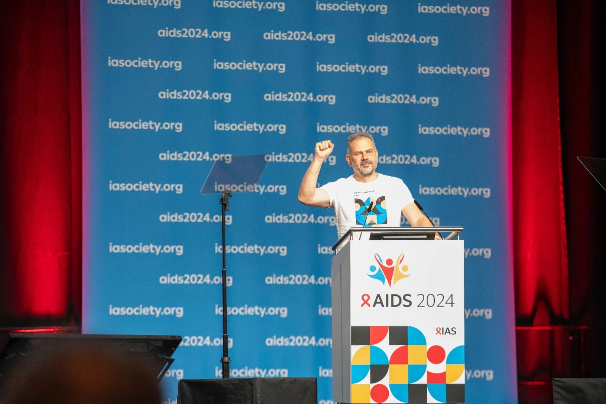 Andriy Klepikov, executive director of Ukraine's Alliance for Public Health, speaks about efforts to diagnose and treat HIV during his talk at the AIDS 2024 conference this summer.