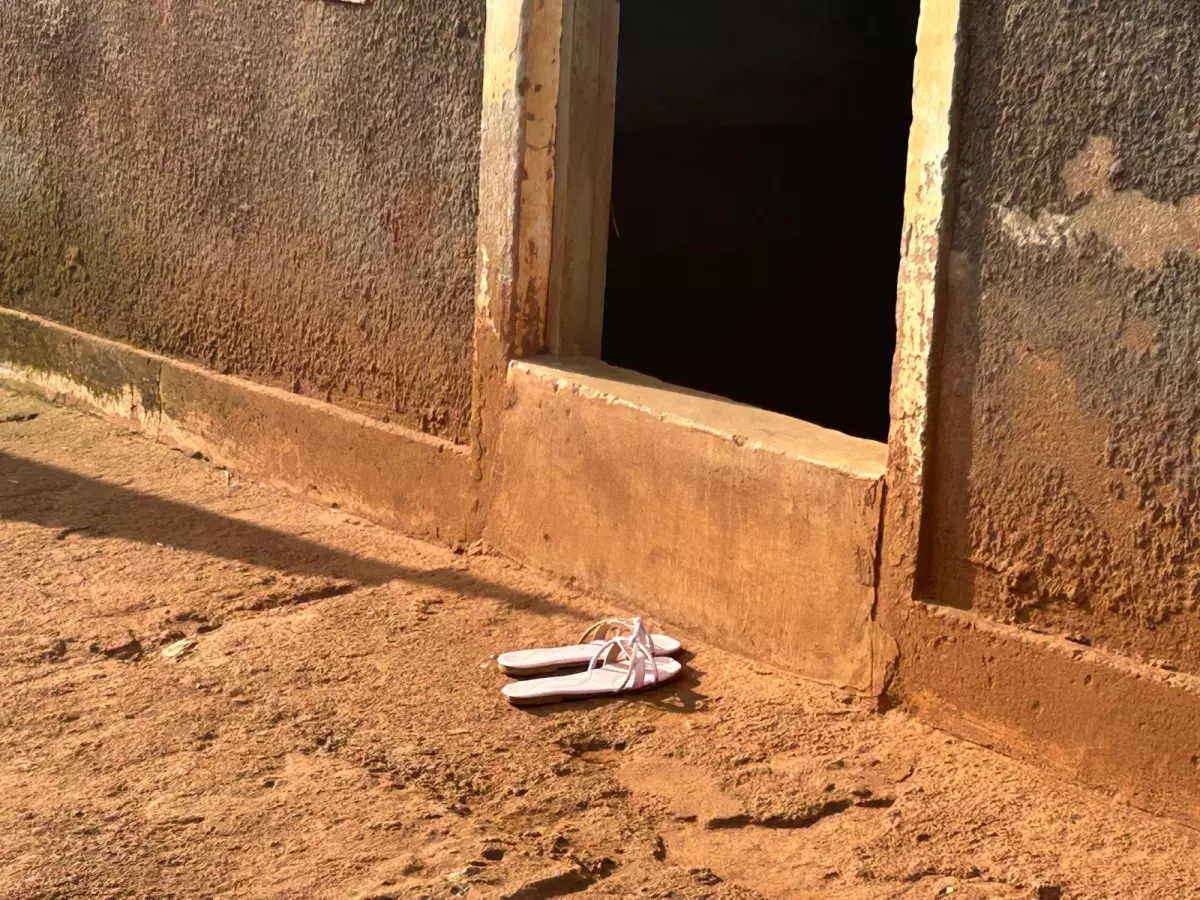 Sandals outside a brothel on the Uganda-Kenya highway. Among the many losses after the U.S. aid cuts: free condoms and PrEP for sex workers.