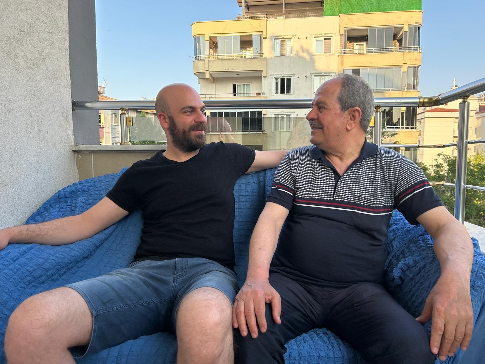 Adham Aljamous, 32, and his father Nouruldeen, 72, on their rooftop in Gaziantep, Turkey. They fled Syria over a decade ago. Now, with a chance to return, they