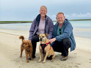 Susan Chinnery and Steve Lewis with their dogs Connie and Truffle on the island of Westray in Orkney.