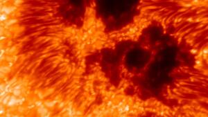 An image captured by the Daniel K. Inouye Solar Telescope in Hawaii shows sunspots on the star's surface.