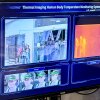As travelers entered the Entebbe International Airport in Uganda on May 21, they were screened with a thermal camera that detects their temperature. Pictured at bottom is reporter Michal Ruprecht.