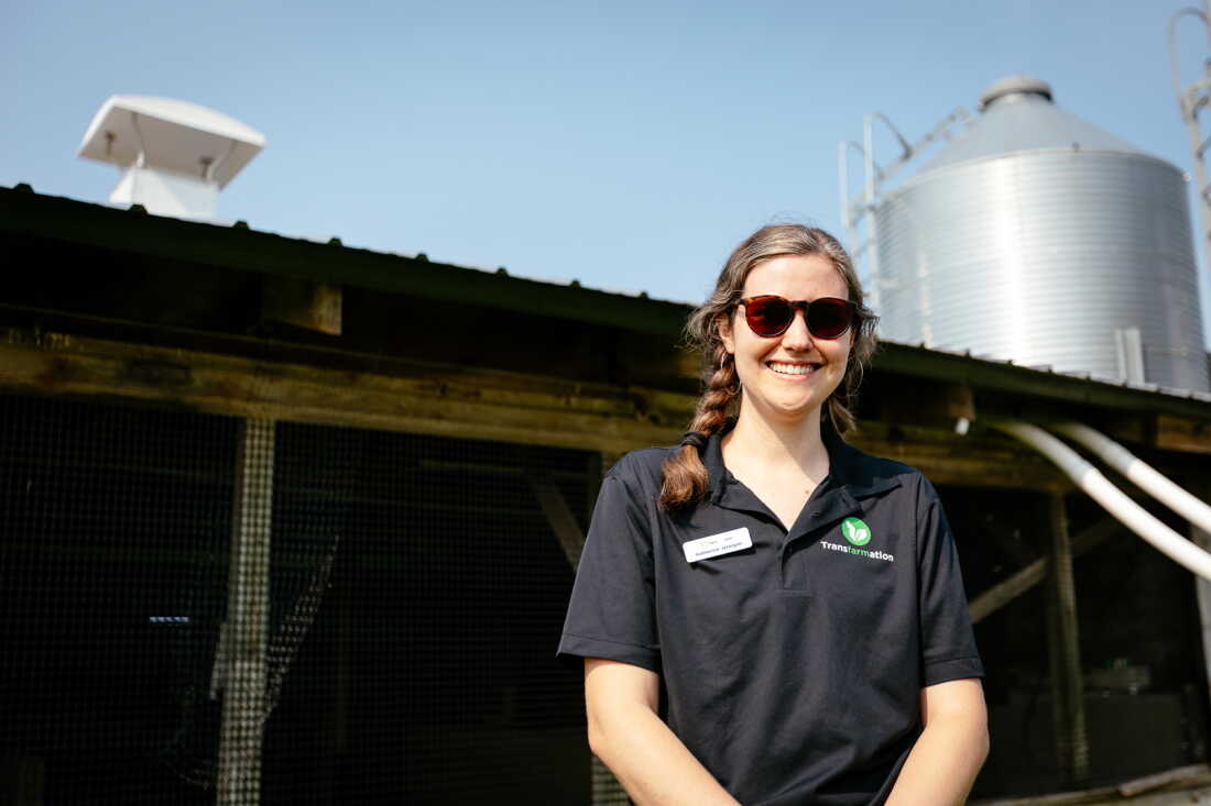 Katherine Jernigan of Transfarmation stands in front of an unused pig shed.