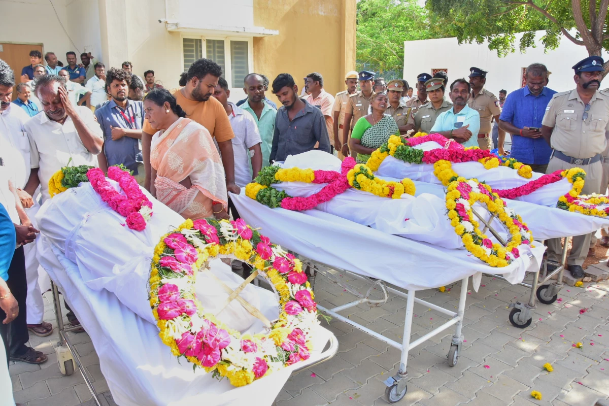 Relatives of people who were killed in a stampede during a rally for a popular Indian actor and politician, mourn as they take the bodies from a hospital, in Karur, in the southern state of Tamil Nadu, Sunday, Sept. 28, 2025.