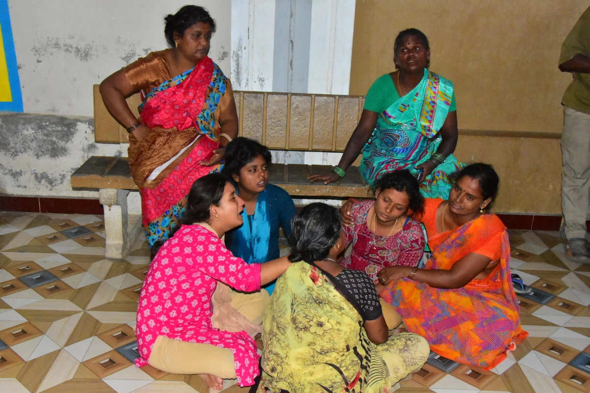 Relatives of people who were killed in a stampede during a rally for a popular Indian actor and politician, mourn outside a hospital, in Karur, in the southern state of Tamil Nadu, Saturday, Sept. 27, 2025.