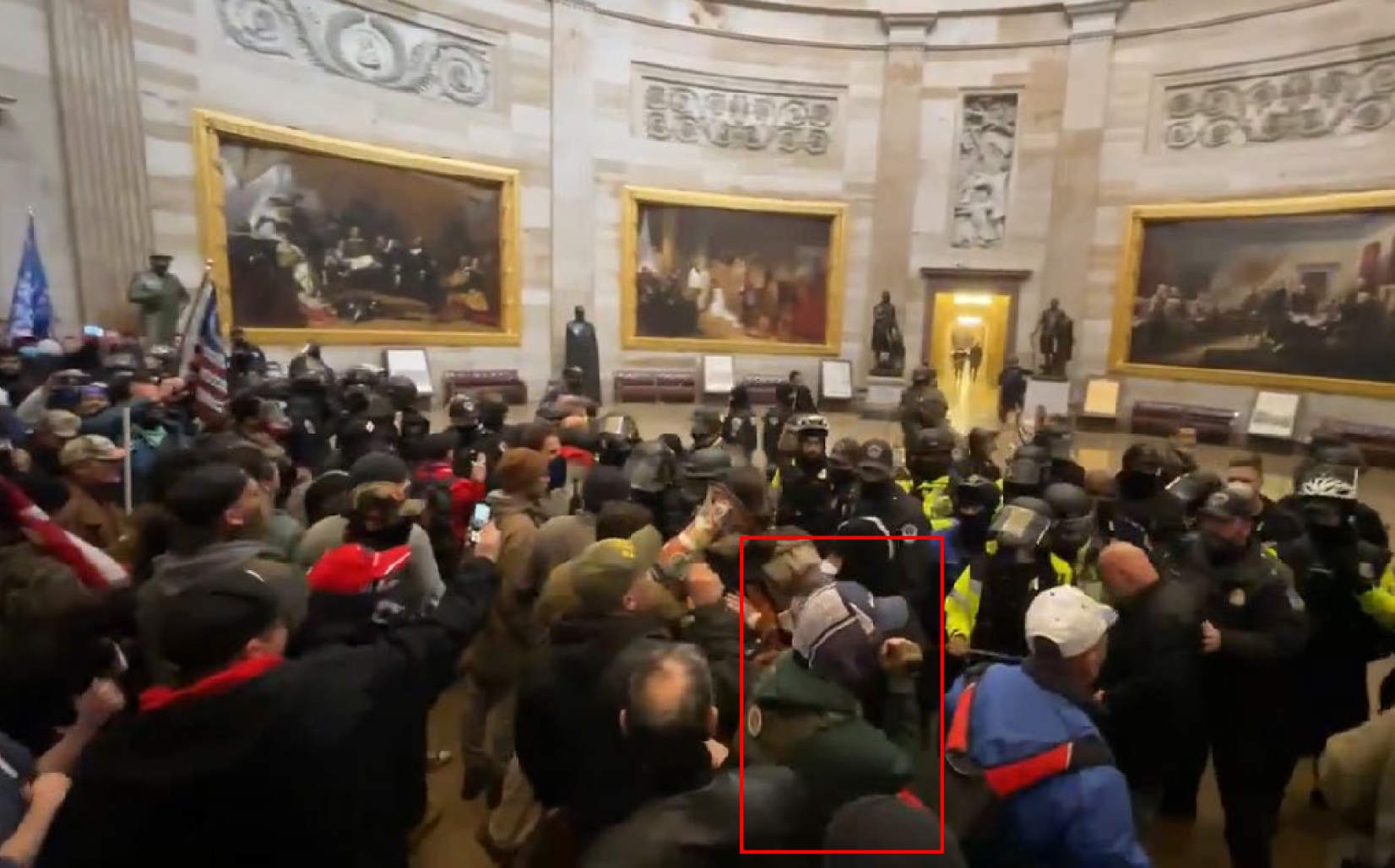 A screenshot showing Glen Simon (highlighted in the red rectangle) entering the U.S. Capitol Rotunda on Jan. 6, 2021. Prosecutors cited this photo in the case against Glen Simon. A coalition of media organizations said Tuesday that video evidence from Simon