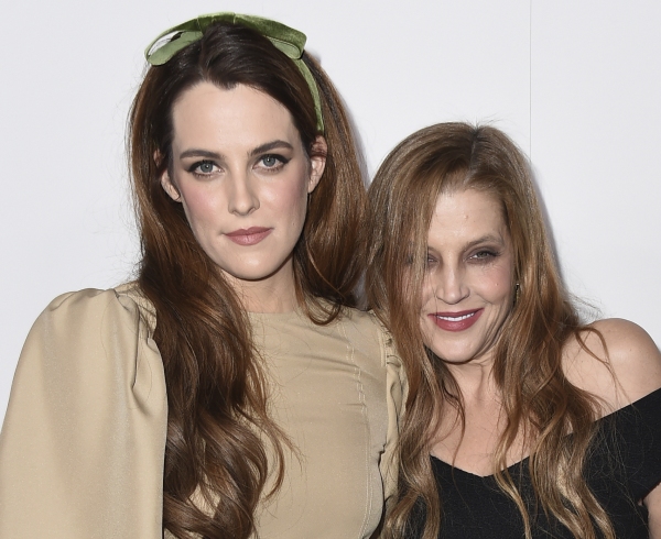 FILE - Riley Keough, left, and her mother Lisa Marie Presley arrive at the 24th annual ELLE Women in Hollywood Awards on Oct. 16, 2017, in Los Angeles. (Photo by Jordan Strauss/Invision/AP, File)