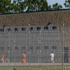 The detainees are seen in a courtyard at Folkston Ice Processing Center on September 9, 2025 in Folkston, Georgia. The two State Democratic Senators require responses from the Ministry of Internal Security after more than a dozen people died in immigration detention establishments.