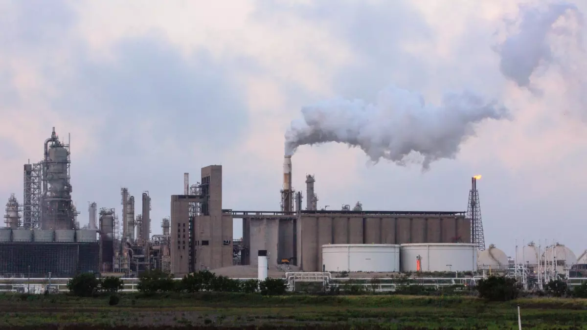 Steam billows from Valero's West Refinery outside Corpus Christi in April. Cooling towers at industrial facilities can evaporate more than 1,000 gallons of water per minute.