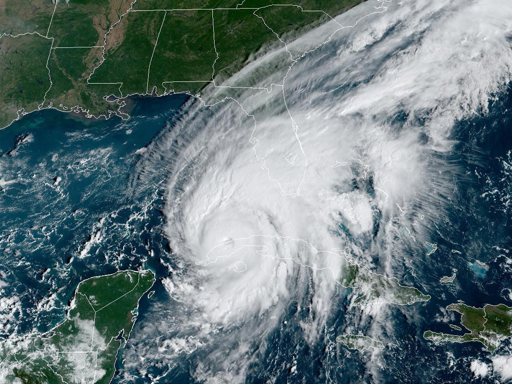 Hurricane Ian passes over western Cuba in 2022, as captured by a U.S. weather satellite. Climate change is causing more extreme weather, and creates new challenges for weather forecasters.