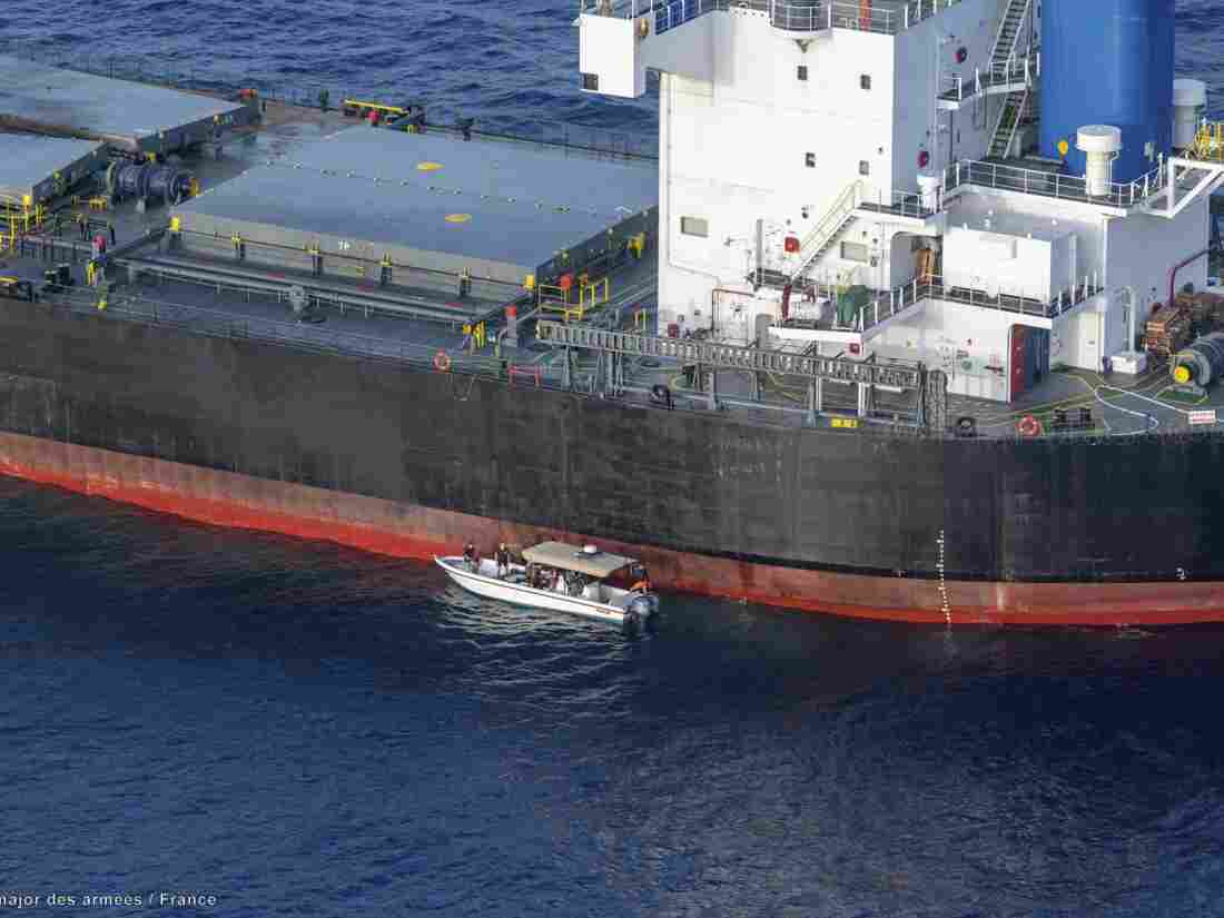 In this undated photo provided by the Etat Major des Armees on Thursday, May 30, 2024, a view of the Laax, a Greek-owned, Marshall Islands-flagged bulk carrier that came under attack by Yemen's Houthi rebels earlier this week, carrying cargo of grain bound for Iran, the group's main benefactor, authorities said Thursday. (Etat Major des Armees via AP)