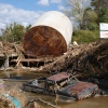 A truck is stuck in water and mud following flooding from Hurricane Helene in western North Carolina.