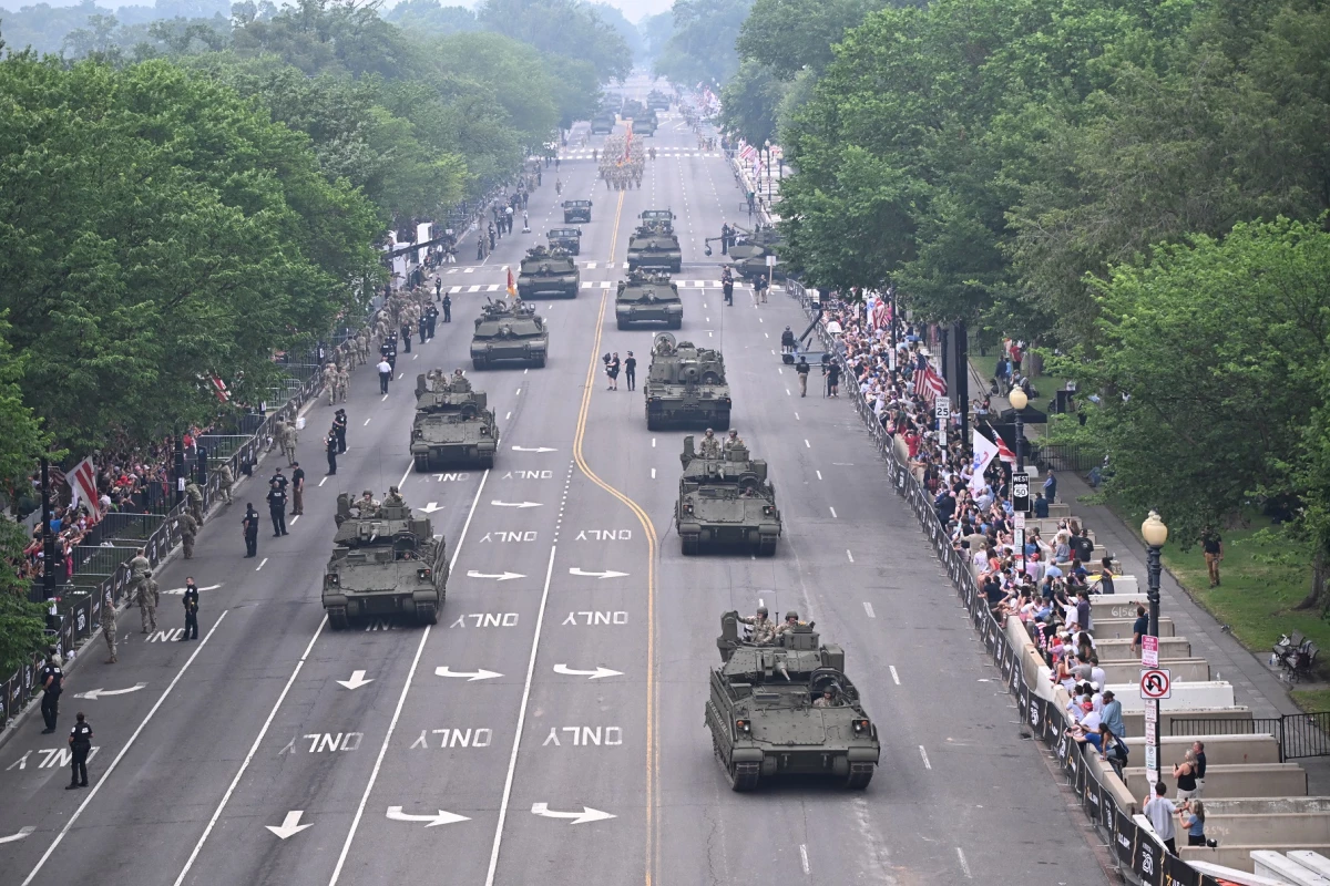 Armored vehicles drive during the Army 250th Anniversary Parade in Washington, DC on June 14, 2025.