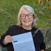 Ellen Allen holds the letter from President Donald Trump that explains the $500 payment she got. 