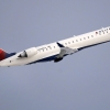 Short regional flights are the lifeblood of U.S aviation — but they were in decline even before jet fuel concerns struck. Here, a file photo shows a Delta Air Lines Connection regional jet operated by GoJet Airlines taking off from Logan International Airport in Boston.