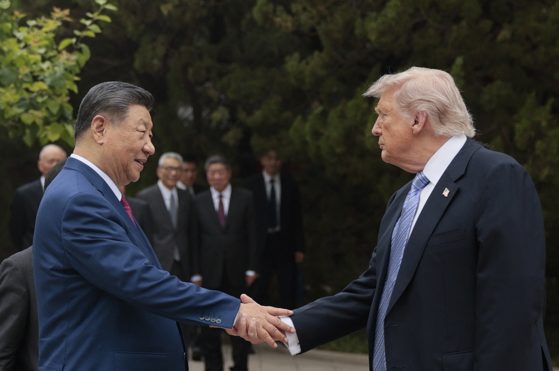 President Trump shakes hands with China