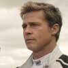 Damson Idris as Joshua Pearce and Brad Pitt as Sonny Hayes in F1.