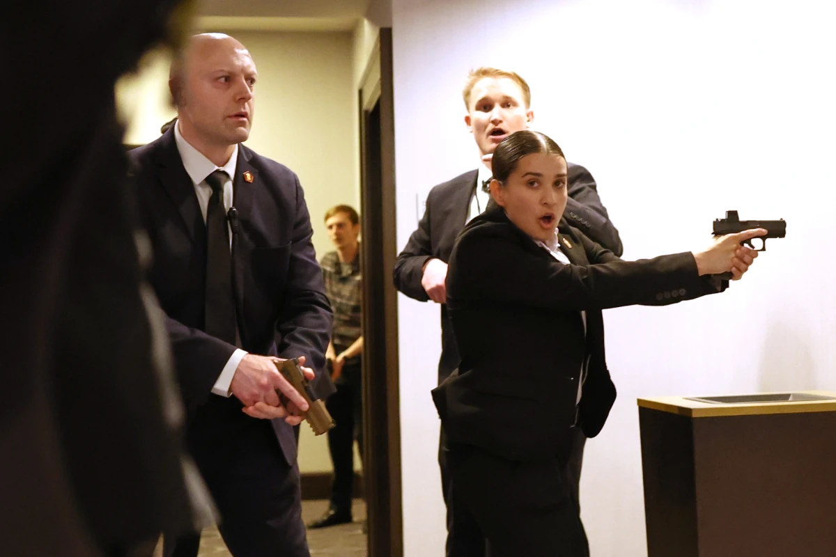 Secret service agents respond after shots were fired during the White House Correspondents' Dinner on Saturday.