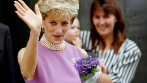 Diana, Princess of Wales, waves to the crowd as she leaves the Victor Chang Cardiac Research Institute in Sydney Australia, Nov. 1, 1996.