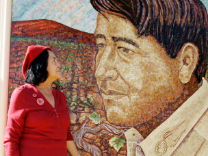 Dolores Huerta looks at a mural of the late Cesar Chavez during a dedication of the Cesar Chavez Monument on the San Jose State University campus in San Jose, Calif., Sept. 4, 2008.