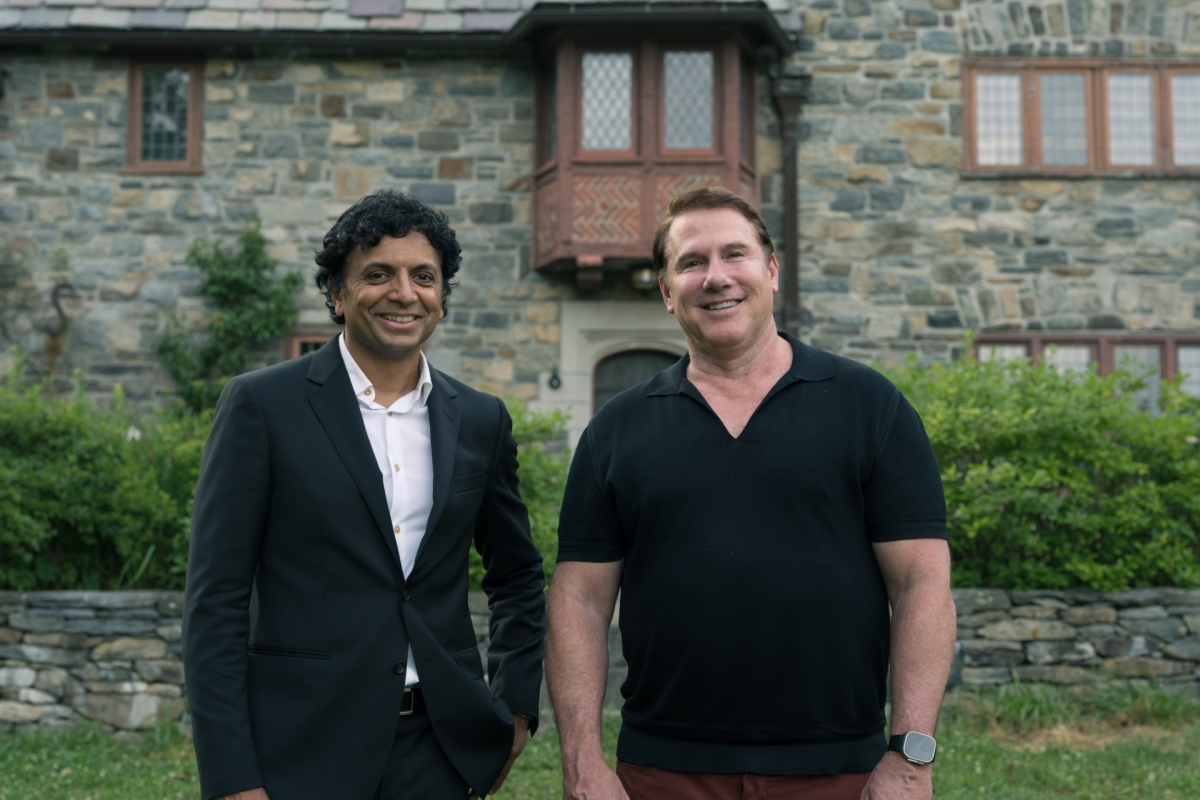 Shyamalan, left, and Sparks, right, almost collaborated in the late 1990s on adapting Sparks' The Notebook. Nearly three decades later, they've joined forces for the first time on the book and film project Remain.