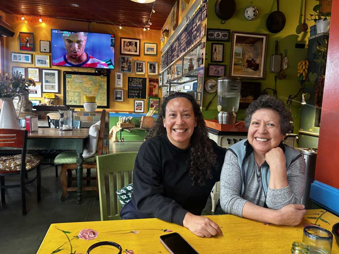 Giselle Rosas and her mother Graciela Reyes cheered for the U.S. men’s national soccer team on Wednesday at Cafe Brasil in Culver City, Calif.