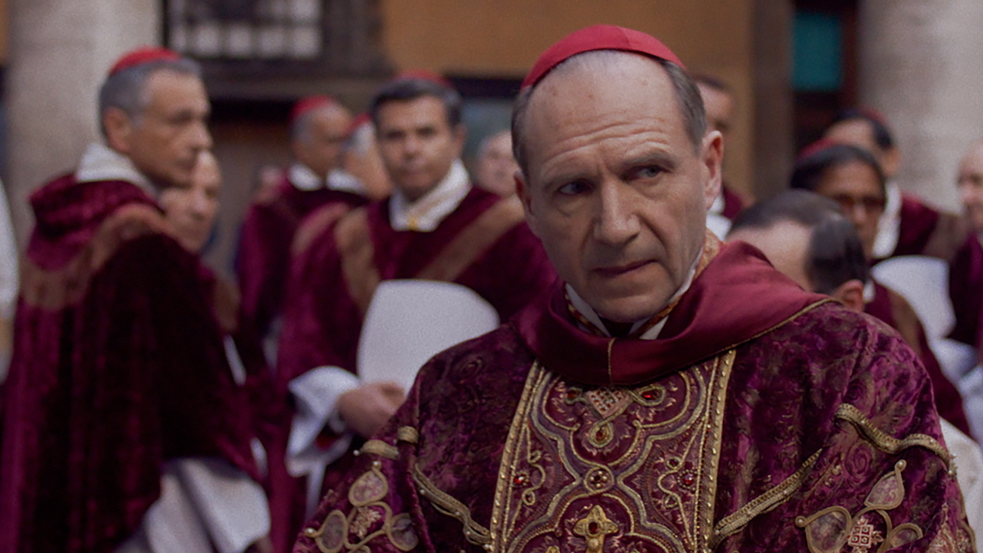 Cardinal Lawrence (Ralph Fiennes) oversees the contingent that will select the next pope in <em>Conclave</em>.