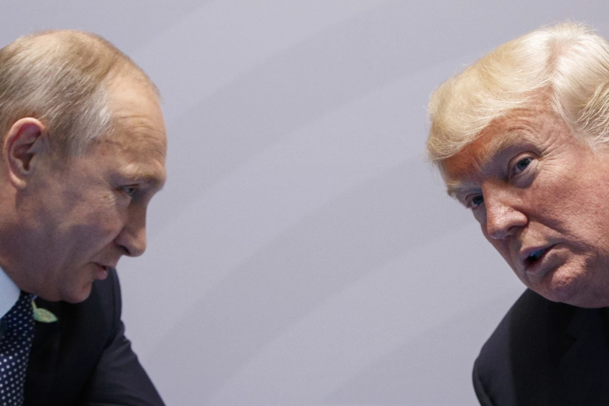 FILE - President Trump meets with Russian President Vladimir Putin at the G20 Summit on July 7, 2017, in Hamburg, Germany.
