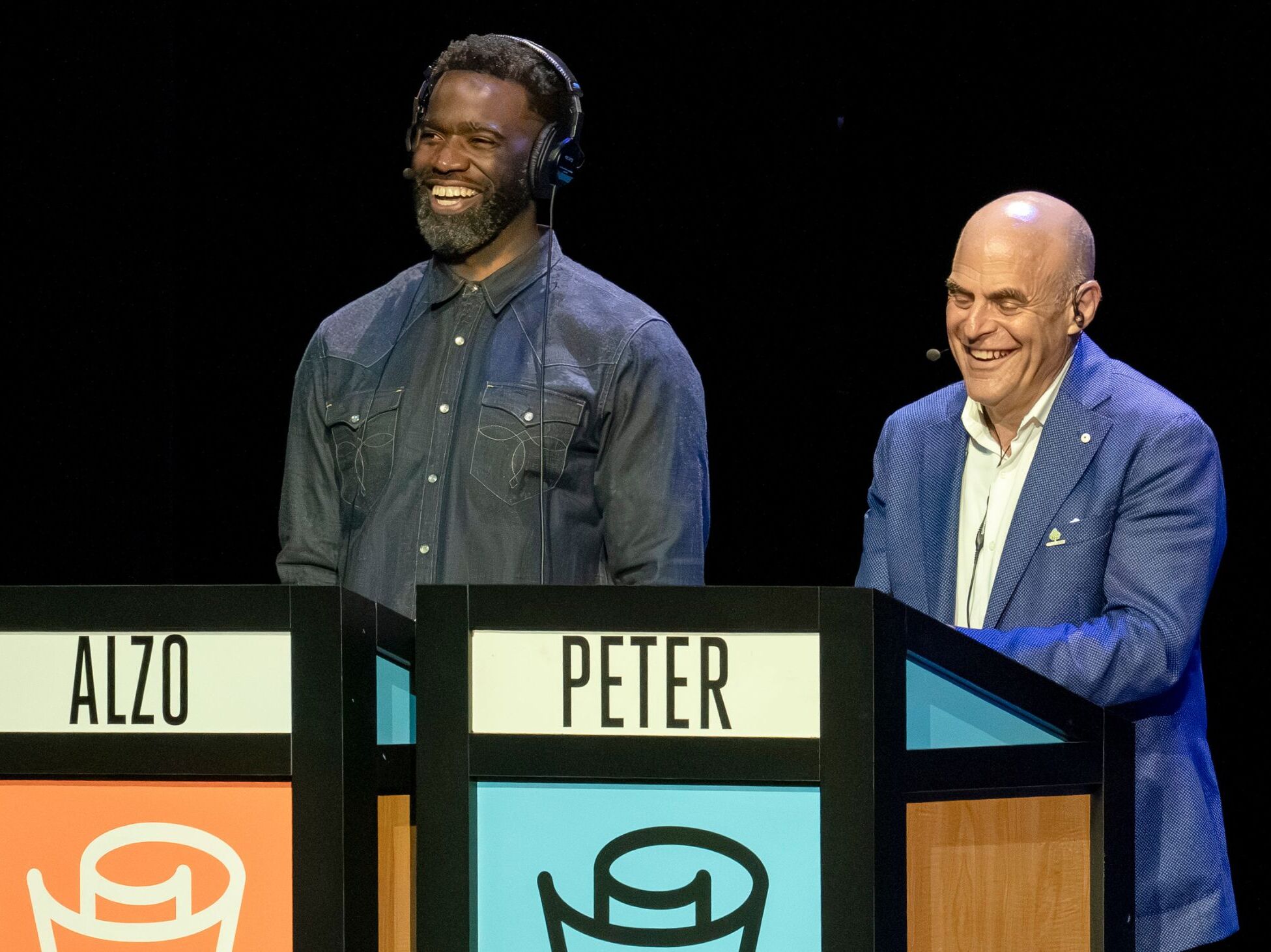 Alzo Slade and Peter Sagal on stage at the Studebaker Theater in Chicago 'Wait Wait' for June 20, 2026: With Not My Job guest Caro Claire Burke