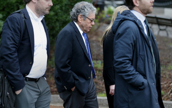 Insys founder John N. Kapoor (center) leaves the John Joseph Moakley United States Courthouse in Boston on May 2, 2019.