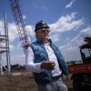 CEO of Cambria Marty Davis speaks on the job site of the countertop company's new $80 million quartz processing plant and rail center in Randolph, Minn., on Aug. 13, 2025.