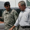 Then-U.S. President George W. Bush talks with then-U.S. Army Lt. Gen. Russel Honoré on the flight deck of the USS Iwo Jima on Sept. 20, 2005, in New Orleans, La.