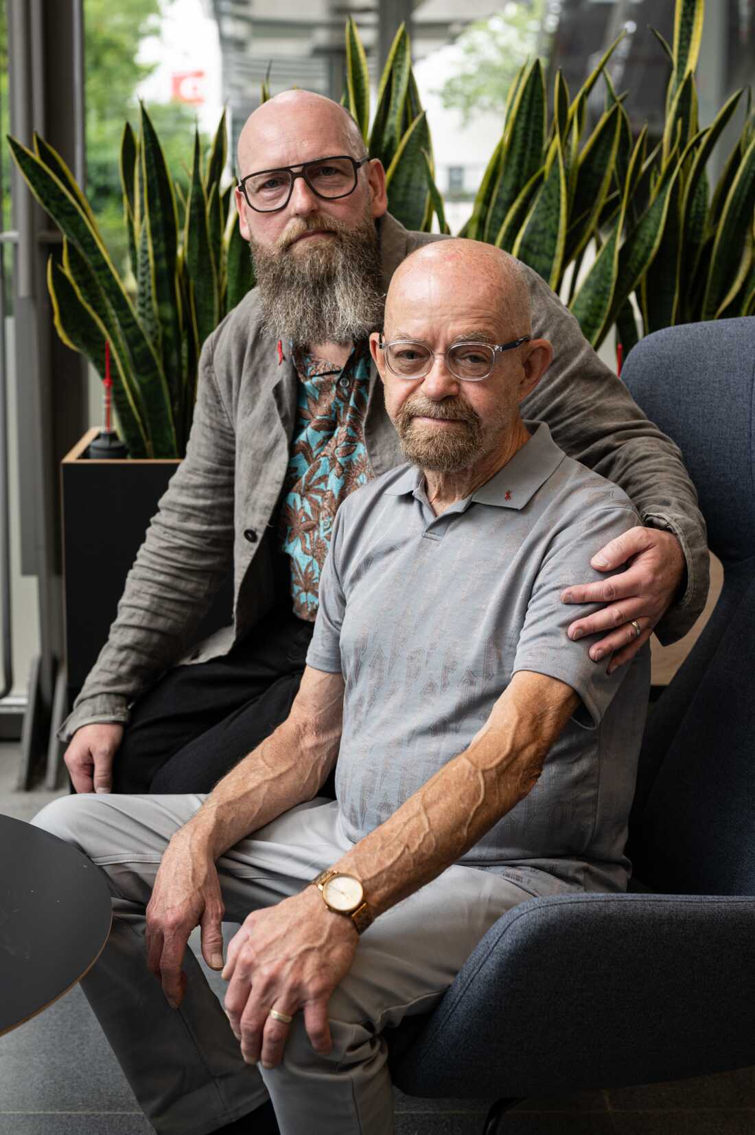 Marc Franke poses for a portrait with Paul Edmonds. Both patients have been cured of HIV.