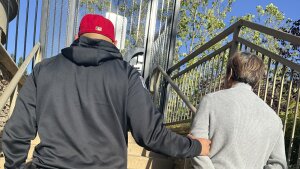 Tuen Kit Lee is led away in handcuffs on Tuesday, May 28, 2024, in Danville, Calif. The fugitive dubbed the "bad breath rapist" was arrested in the San Francisco Bay area more than 16 years after he fled following his conviction for sexually assaulting a co-worker in Massachusetts, authorities said this week.