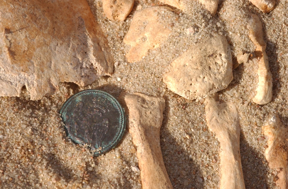 An Imperial Guard button was discovered when the mass grave was excavated.