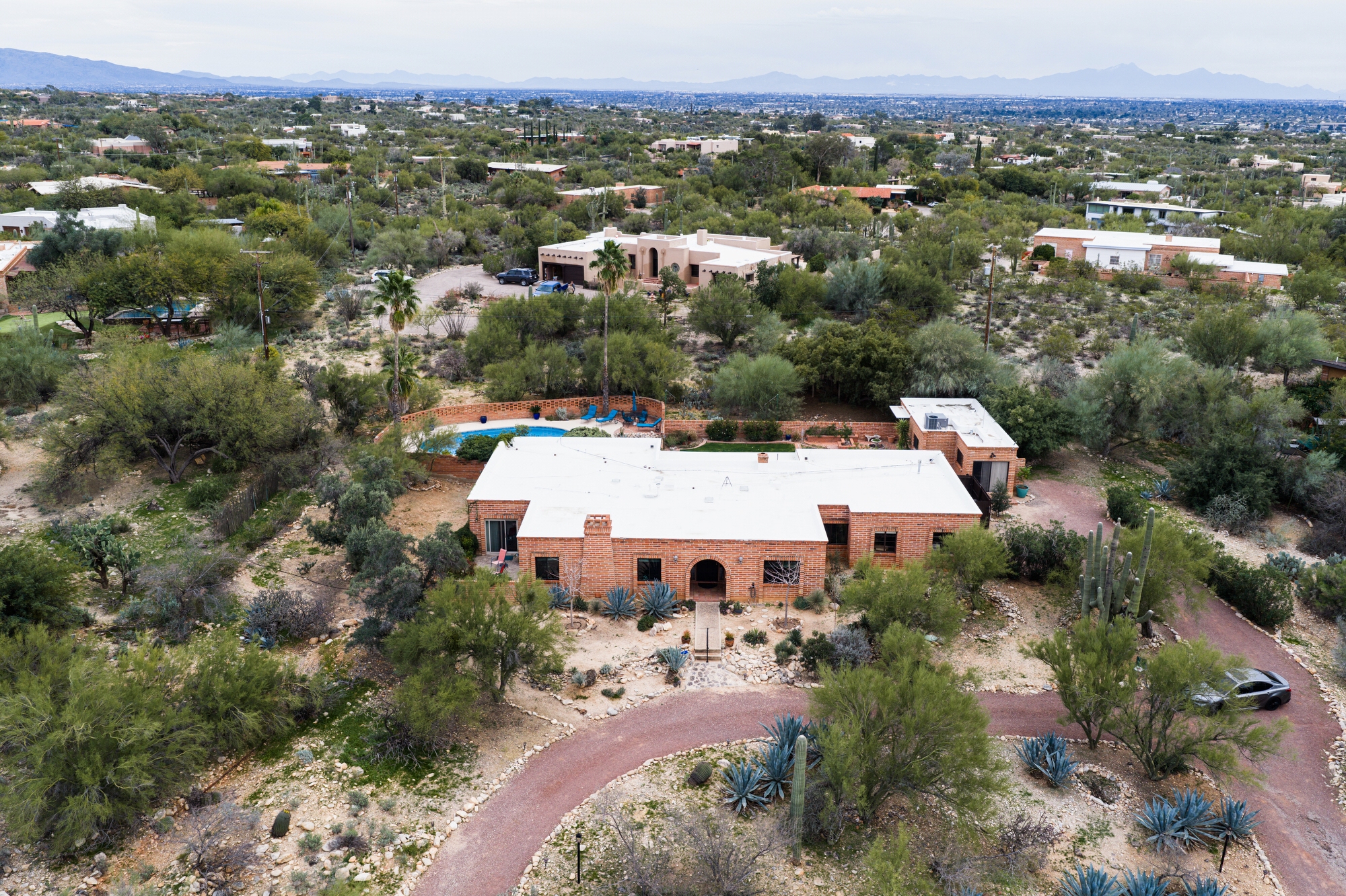 The home of Nancy Guthrie, the missing mother of "Today" show host Savannah Guthrie, is seen from above, Thursday, Feb. 5, 2026, in Tucson, Ariz.