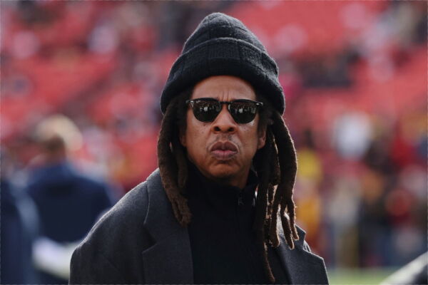 Rapper Jay-Z looks on before a game between the Washington Commanders and the Dallas Cowboys at Northwest Stadium on November 24, 2024 in Landover, Maryland.