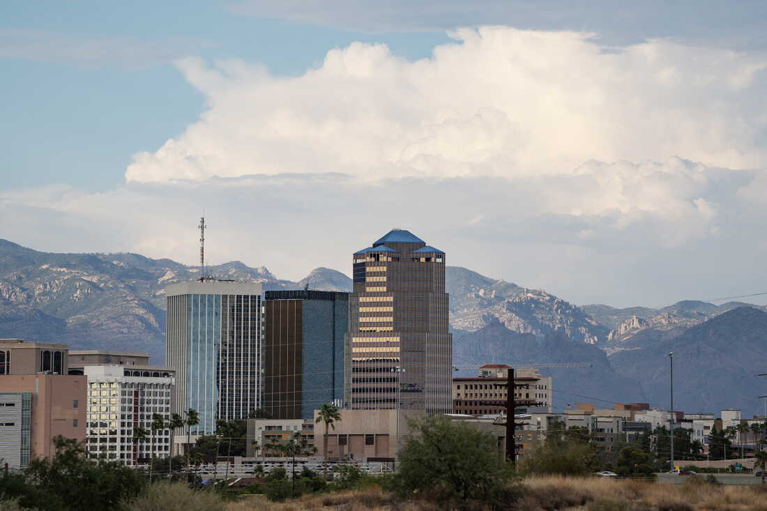 Storm clouds loom behind the downtown skyline during a heat wave in Tucson, Arizona, on July 15, 2023. (Photo by Rebecca NOBLE / AFP) (Photo by REBECCA NOBLE/AFP via Getty Images)