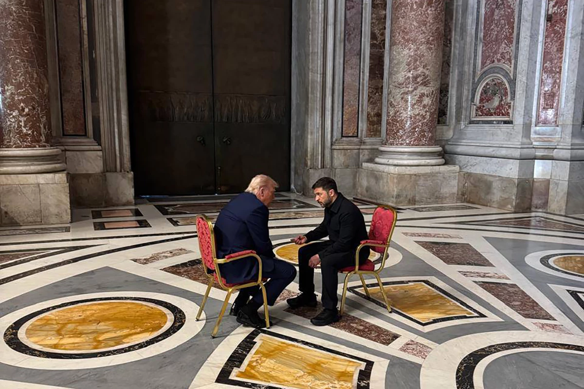 A photo provided by the Ukrainian Presidential Press Office shows Ukrainian President Volodymyr Zelenskyy (right) and President Trump, talking as they attend the funeral of Pope Francis in the Vatican, April 26.