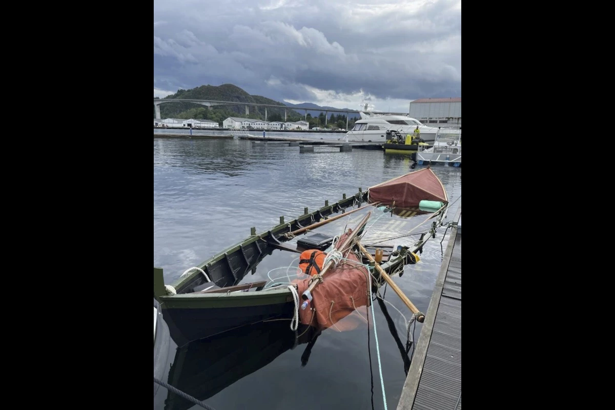 This photo released by the Norwegian Police shows the Viking ship replica, called Naddodd, moored at the quay in Måløy, Norway, on Wednesday, after it capsized earlier this week off Norway's coast.