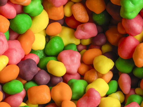 Extreme close up detail pile of multicolored candies