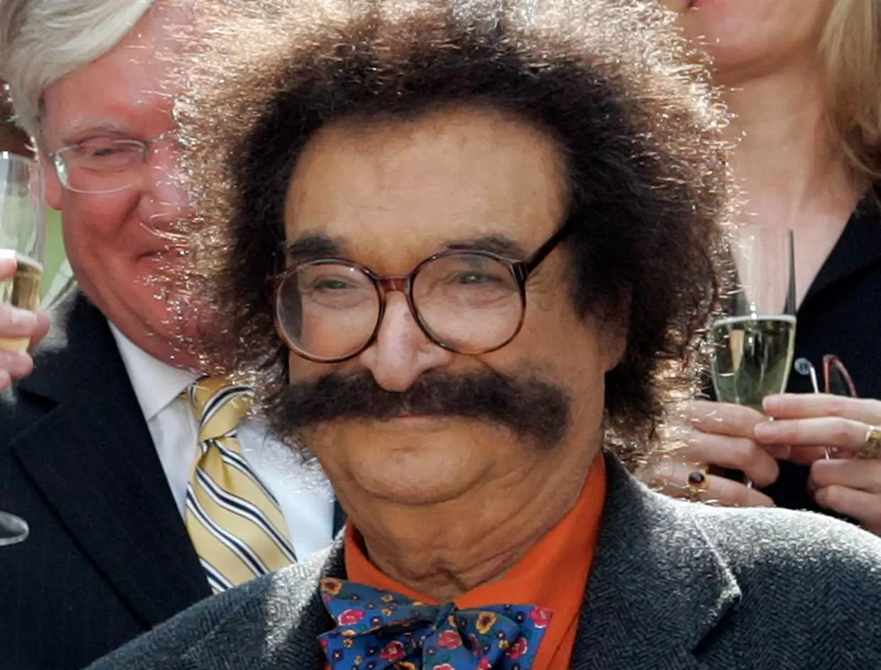 Film critic Gene Shalit is seen during a toast with <em>Today</em> show cast and crew at the end of Katie Couric's final show on May 31, 2006, in New York.