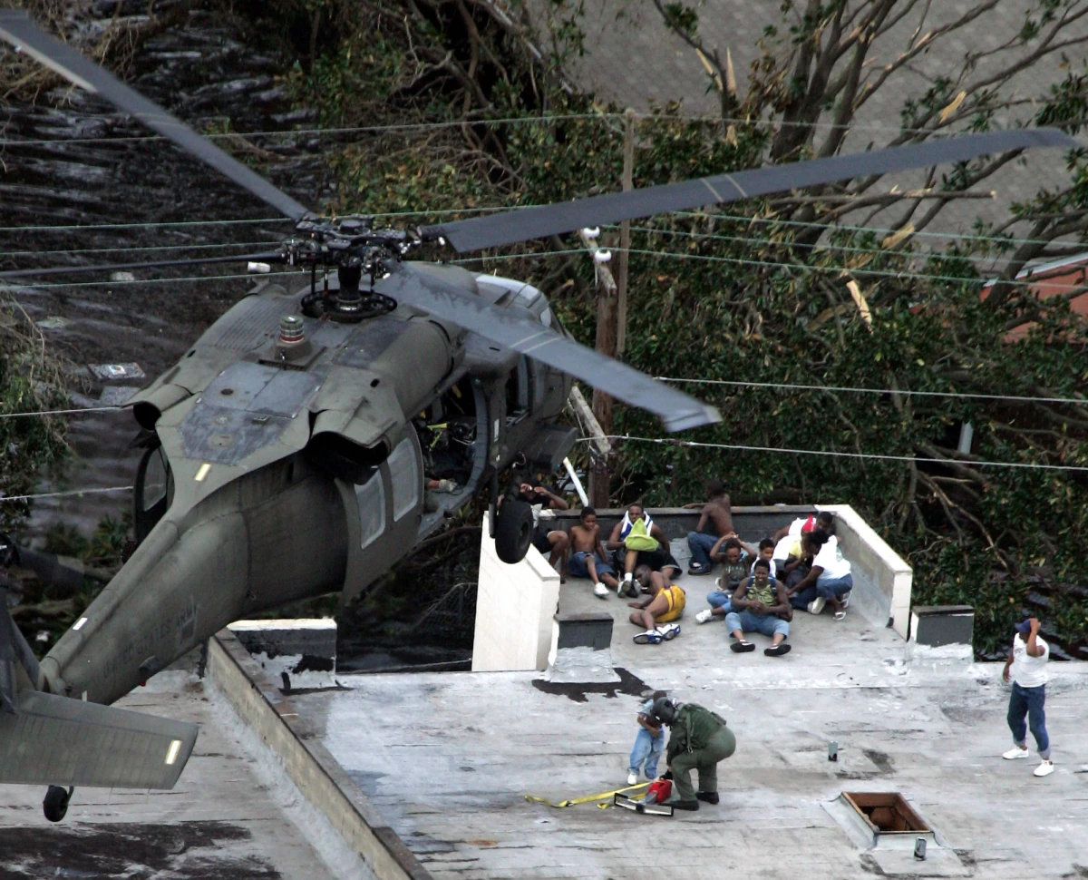 Residents are rescued by helicopter from the floodwaters of Hurricane Katrina on Sept. 1, 2005 in New Orleans.