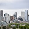 This photo shows the skyline of Denver, with many tall and modern buildings.