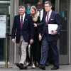 Former U.S. Olympian David Hearn (left) walks with his attorney Norman Eisen to speak to reporters and protesters gathered after his arraignment at the Superior Court of the District of Columbia in Washington, D.C. on Thursday.