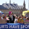 Ralph Regenvanu, Vanuatu's minister for climate change, is joined by climate activists at the International Court of Justice. The country pushed for years for the court to hear its first major climate change case.