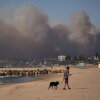 Smoke from a wildfire blankets the sky above Venice Beach in Los Angeles. Air quality in the region is unhealthy because of several wildfires burning.