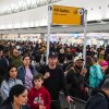 People wait in long TSA security lines at John F. Kennedy International Airport (JFK) in the Queens borough of New York, Monday, March 23, 2026. (AP Photo/Ryan Murphy)