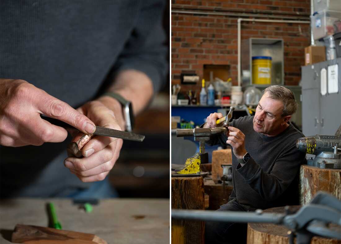 Jeff de Boer hammers a piece of metal to build a new suit of mouse armor.