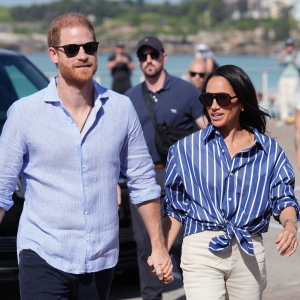 FILE - Prince Harry, and Meghan, the Duke and Duchess of Sussex, arrive for an event, during a visit to Bondi Beach, Australia, April 17, 2026.
